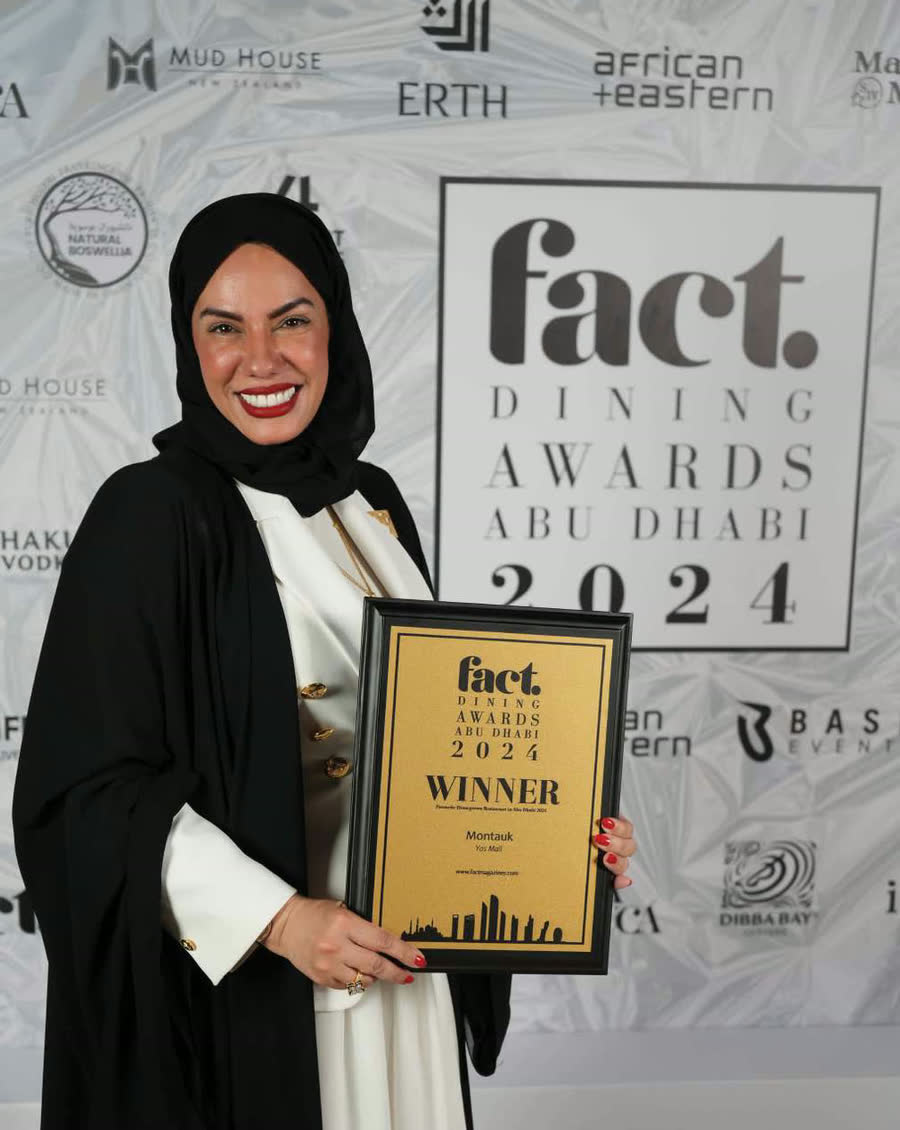 Chef Mariam Almansoori holding the Fact Dining Awards 2024 winner certificate for Montauk, Yas Mall