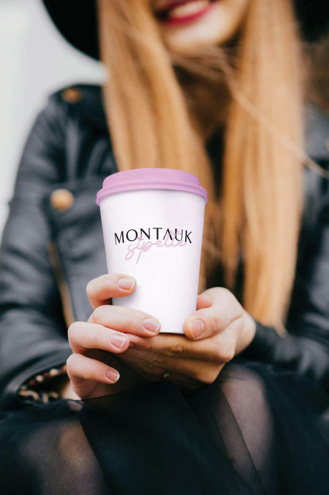 A Montauk Sipette cup held in both hands