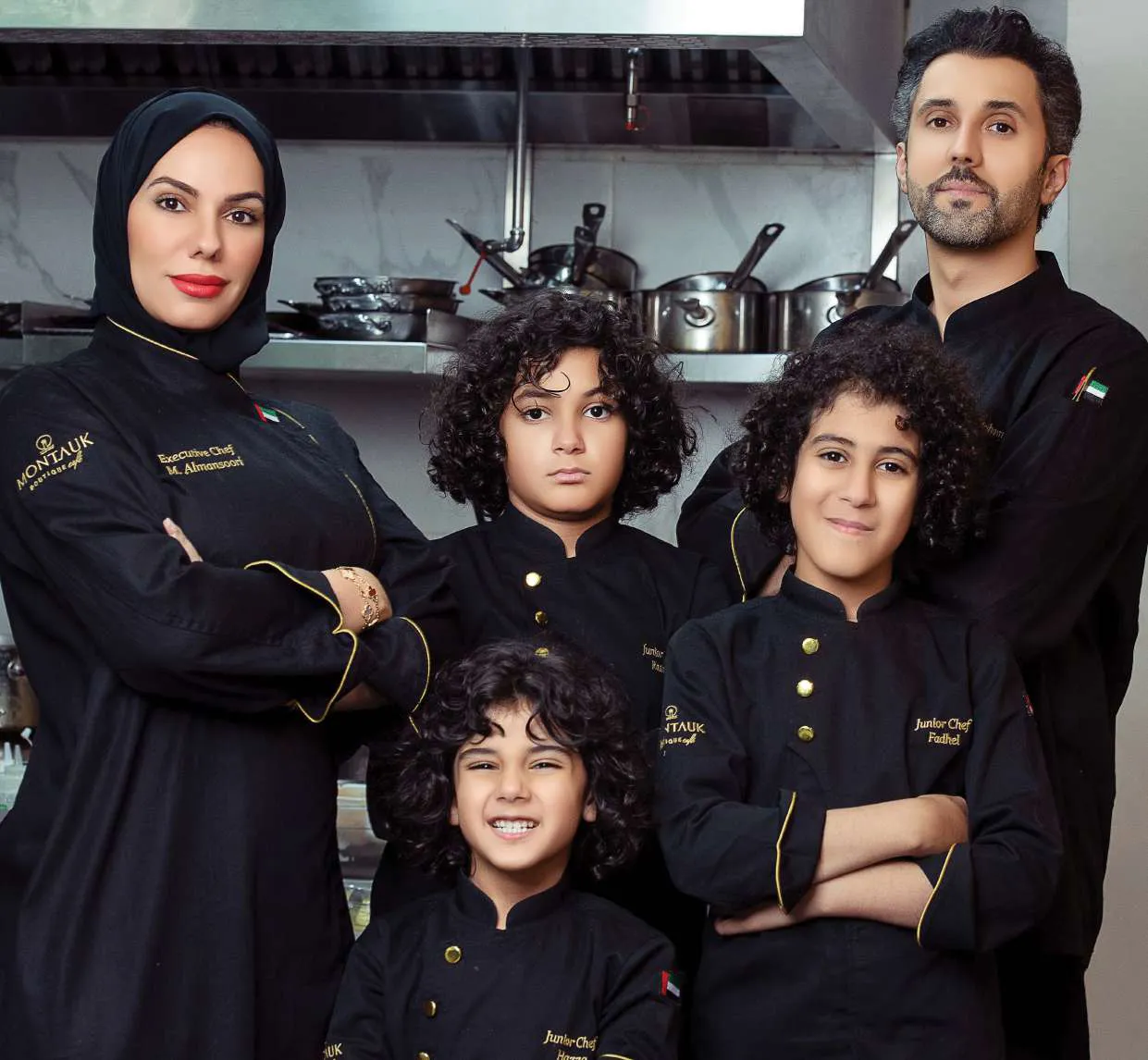The family in chef whites: Chef Mariam, Mohammed Fadhel and the three junior chefs