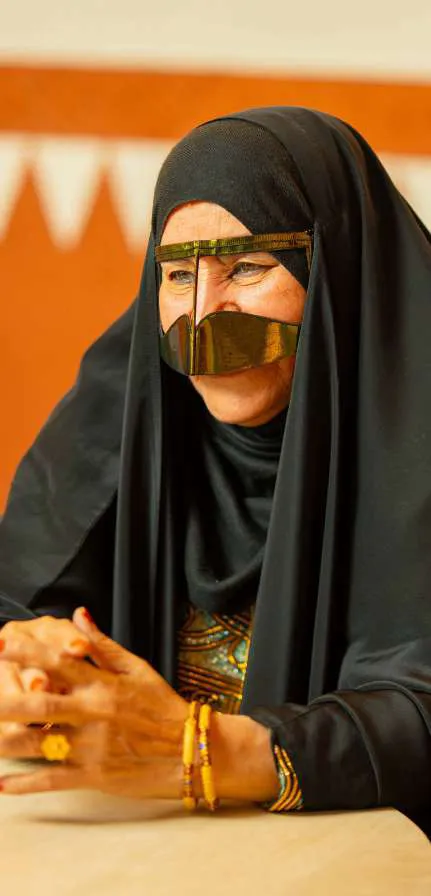 Amina, a portrait in the gold burqa